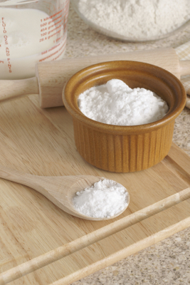 Bowl and spoon with baking soda  Bowl